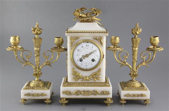 An early 20th century French marble clock garniture, 12in.